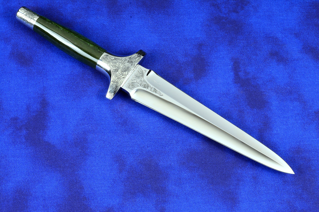 "Daqar" Custom handmade dagger, obverse side view,  in T4 deep cryogenically treated CPM 154CM Powder metal technology martensitic stainless steel blade, hand-engraved, 304 austenitic stainless steel fittings, hand-engraved, nephrite jade gemstone handle, hand-carved leather sheath inlaid with American Bison skin