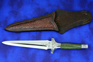 "Daqar" Custom handmade dagger, obverse side view,  in T4 deep cryogenically treated CPM 154CM Powder metal technology martensitic stainless steel blade, hand-engraved, 304 austenitic stainless steel fittings, hand-engraved, nephrite jade gemstone handle, hand-carved leather sheath inlaid with American Bison skin