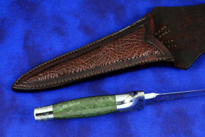 "Daqar" Custom handmade dagger, handle side view,  in T4 deep cryogenically treated CPM 154CM Powder metal technology martensitic stainless steel blade, hand-engraved, 304 austenitic stainless steel fittings, hand-engraved, nephrite jade gemstone handle, hand-carved leather sheath inlaid with American Bison skin